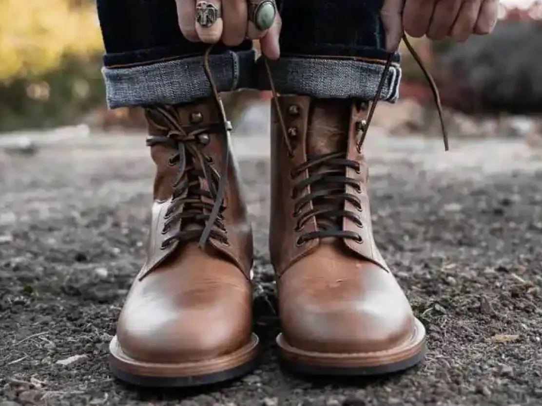 East West Apparel Shopify Website Design boot being tied