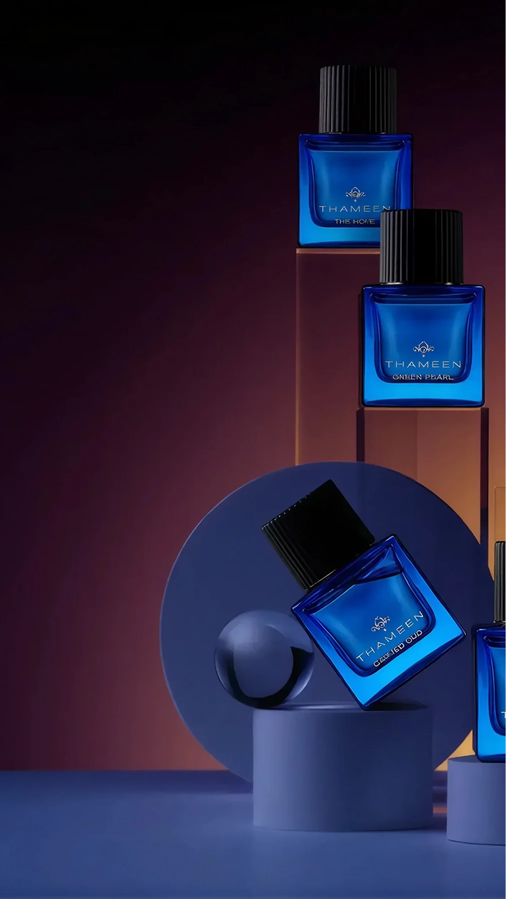 Blue glass perfume bottles on geometric display against a purple gradient background, showcasing Thameen fragrances.